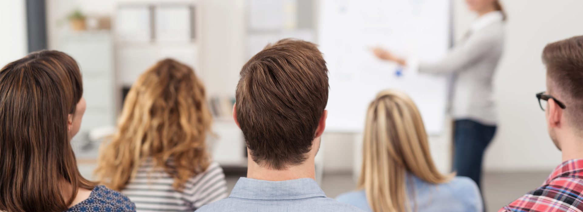 Office Workers Listening to a Manager Explaining replace